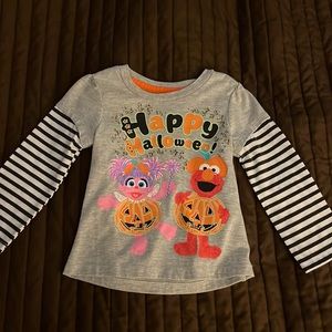 Size 2T. Sesame Street T-shirt little girl. Elmo and Abby